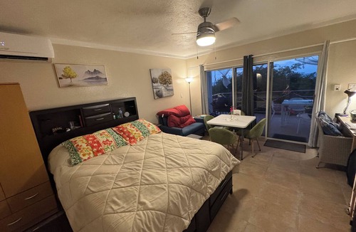 East End Apartment | BVI HEAVEN on beach. Full resort. Batchelor room with huge balcony ocean view