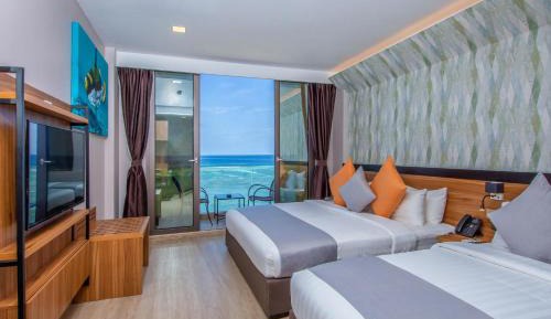 Deluxe Triple Room with Sea View